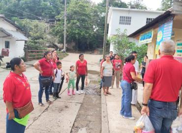Lleva Cáritas ayuda tras desborde del arroyo Tenango