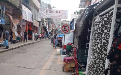 Comerciantes no respetan delimitaciones