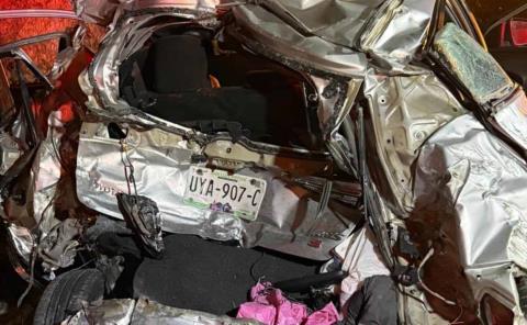 MUJER MUERTA  EN CARAMBOLA       
