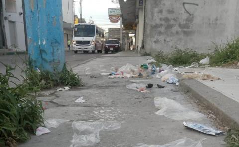 Comerciantes generan  basureros clandestinos
